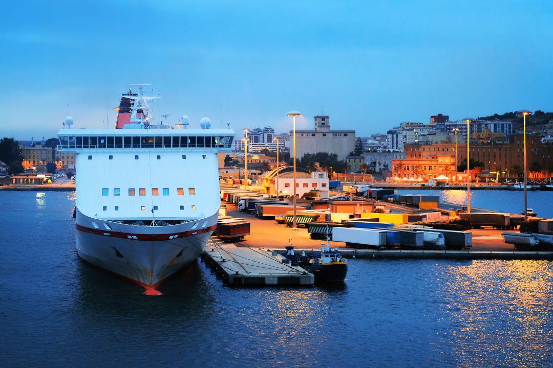 large ferry port and ship at the pier